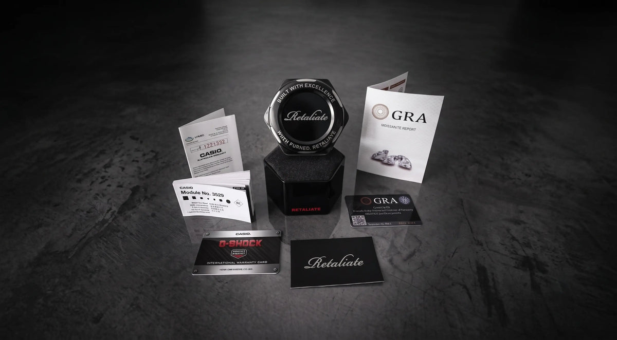 Retaliate custom G-Shock unboxing: branded tin, GRA moissanite certificate, Casio warranty card and authenticity card