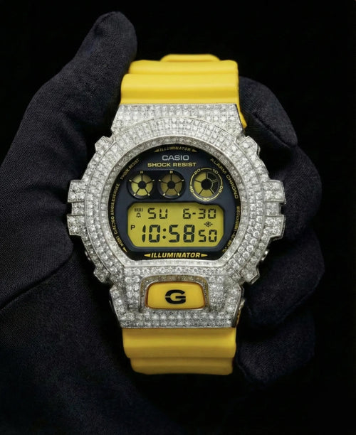 Retaliate iced out gshock watch mod with yellow band and vvs1 diamond-studded bezel, front view
