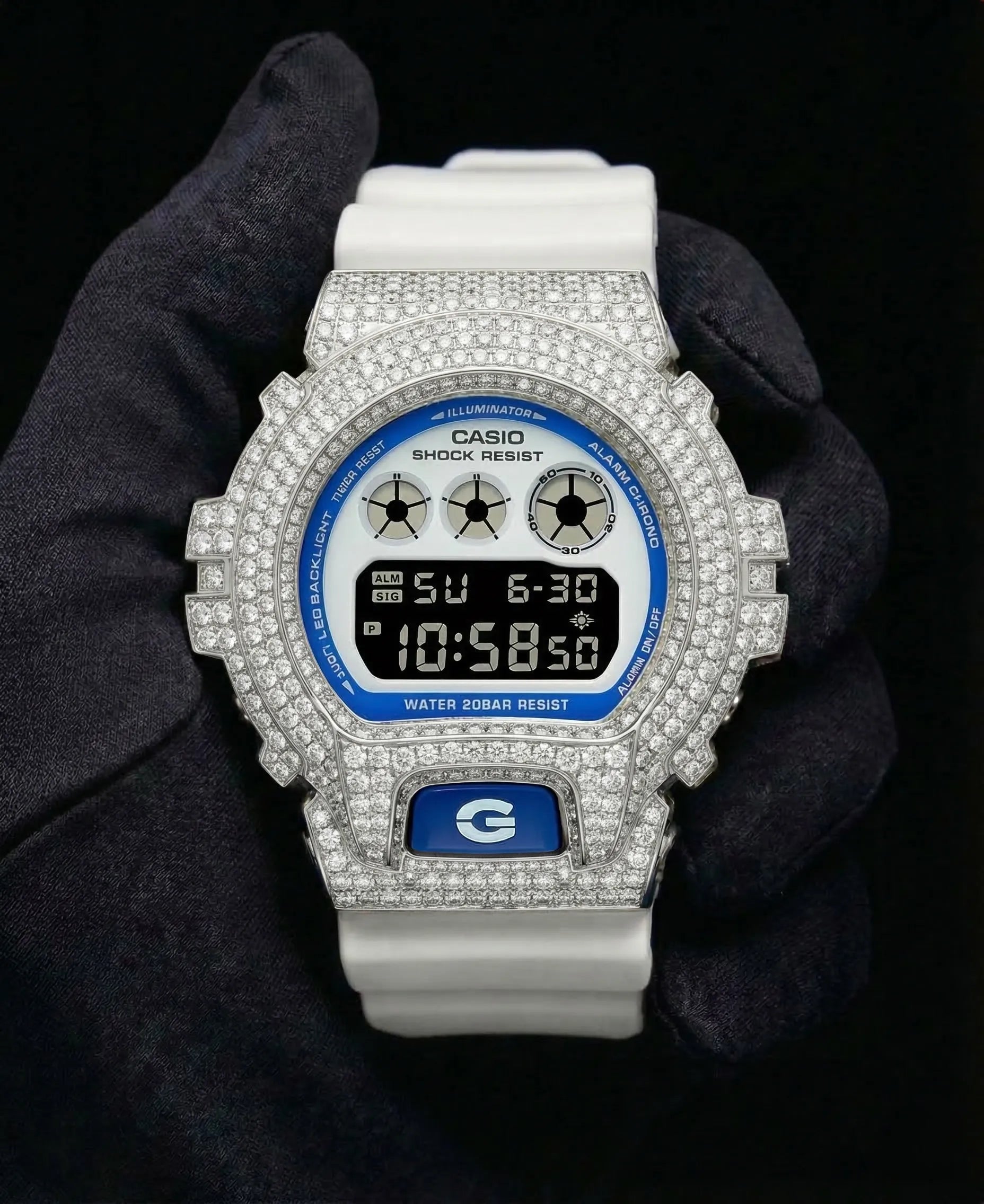 Retaliate Diamond gshock mod iced out with vvs1 stones in white with blue and black details, front view