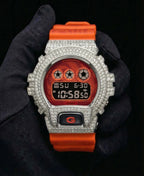 Retaliate iced out gshock watch mod orange and black band, vvs1 diamond-studded bezel, front view
