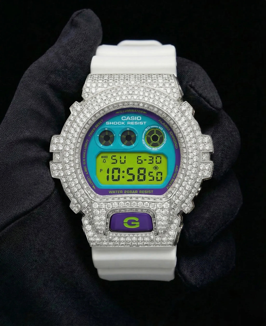Retaliate Diamond gshock mod iced out with vvs1 stones in white with blue, green and purple details, front view