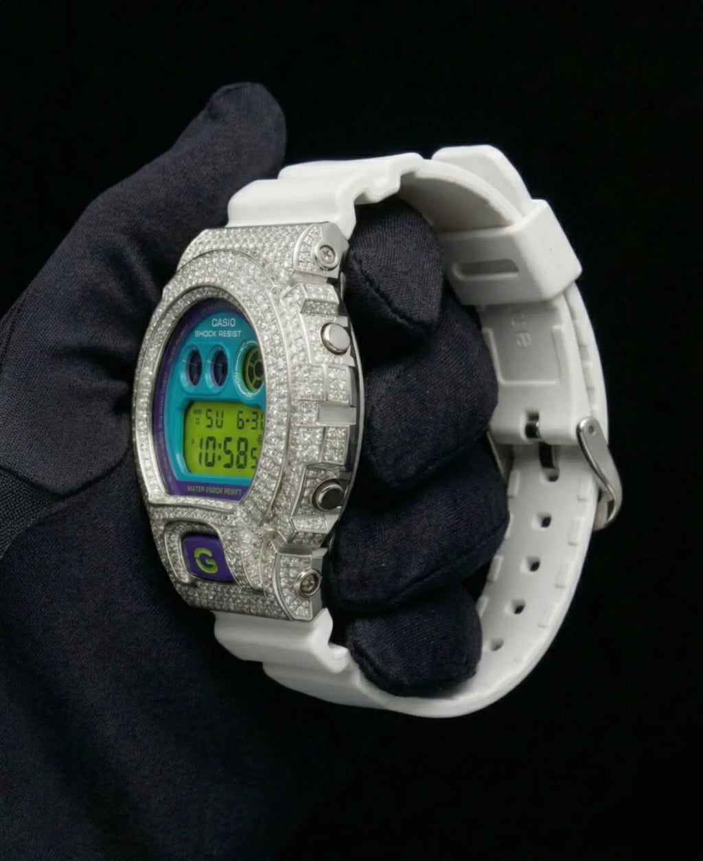Retaliate Diamond gshock mod iced out with vvs1 stones in white with blue, green and purple details, side view