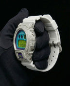 Retaliate Diamond gshock mod iced out with vvs1 stones in white with blue, green and purple details, side view