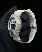 Retaliate Diamond gshock mod iced out with vvs1 stones in white with blue and black details, side view