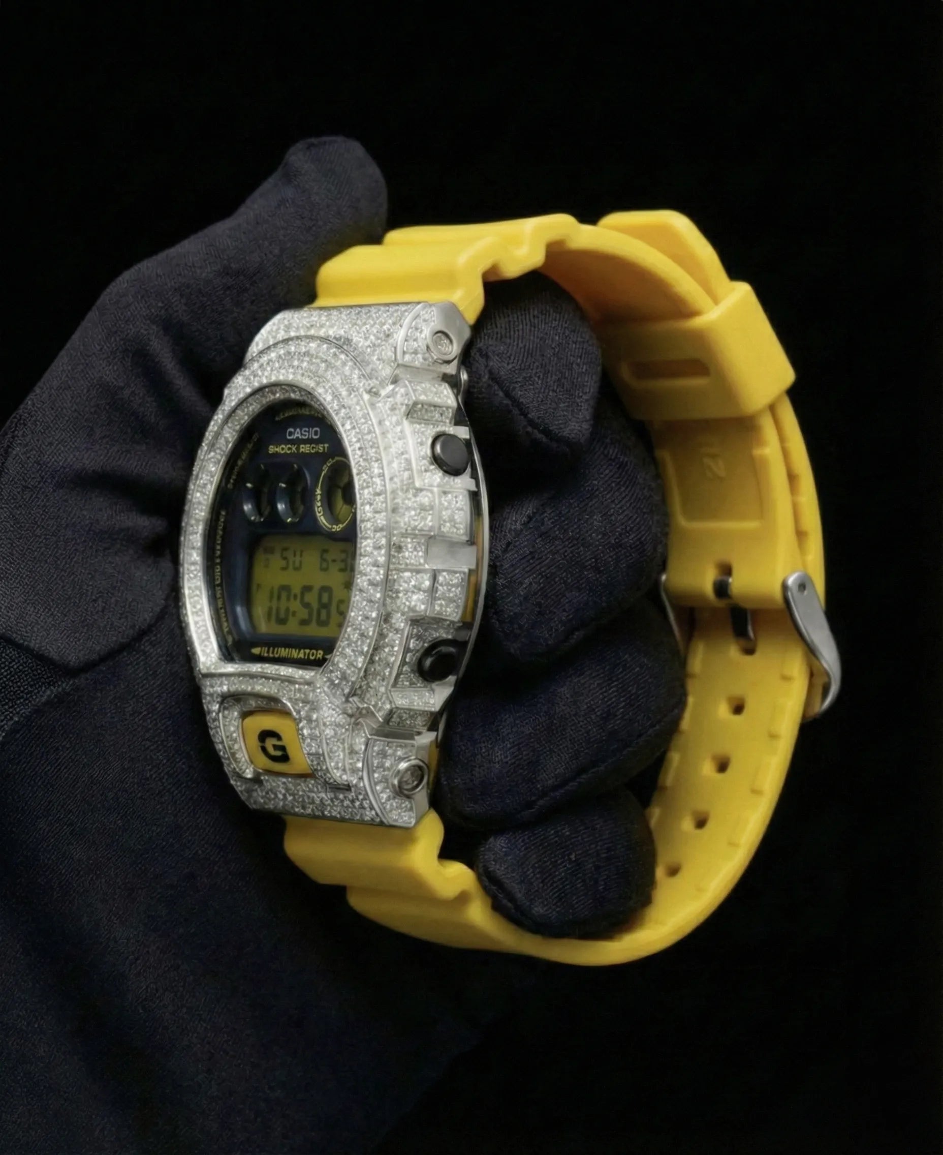 Retaliate iced out gshock watch mod with yellow band and vvs1 diamond-studded bezel, side view