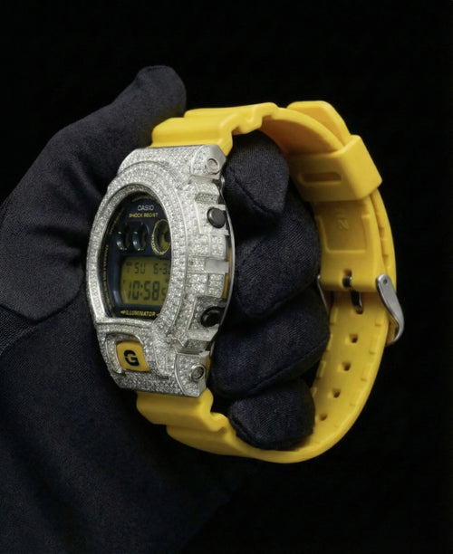 Retaliate iced out gshock watch mod with yellow band and vvs1 diamond-studded bezel, side view