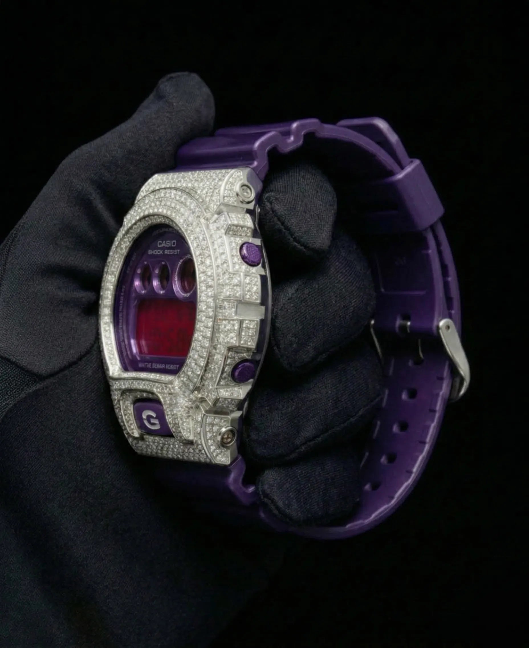 Retaliate Gshock mod iced out with vvs1 diamond bezel in purple, side view