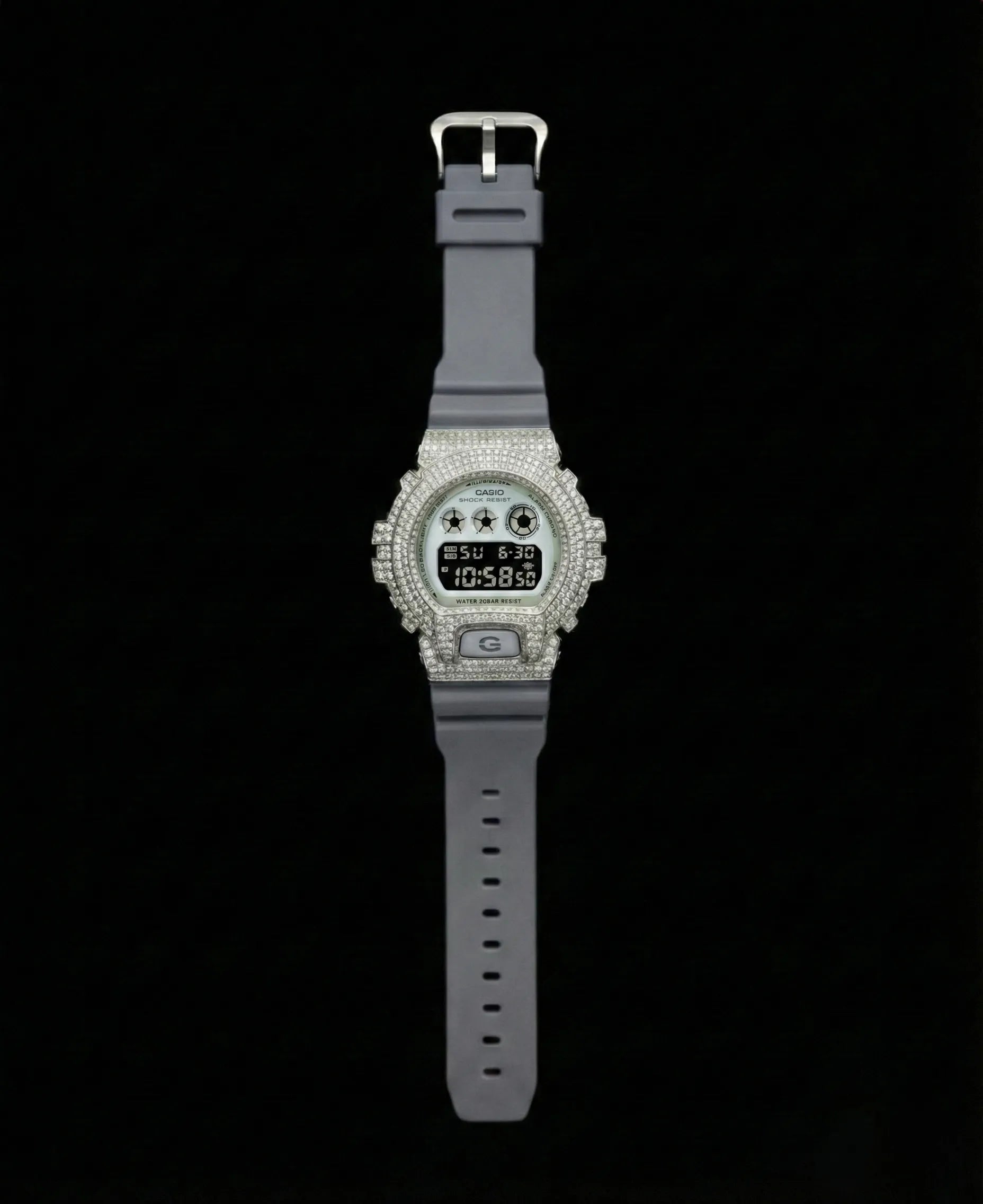 Retaliate iced out gshock diamond mod with vvs1 stones in grey and silver with grey band, full view.
