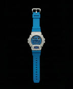 Retaliate iced out gshock mod with vvs1 diamonds in blue with a blue band, up close, full view.
